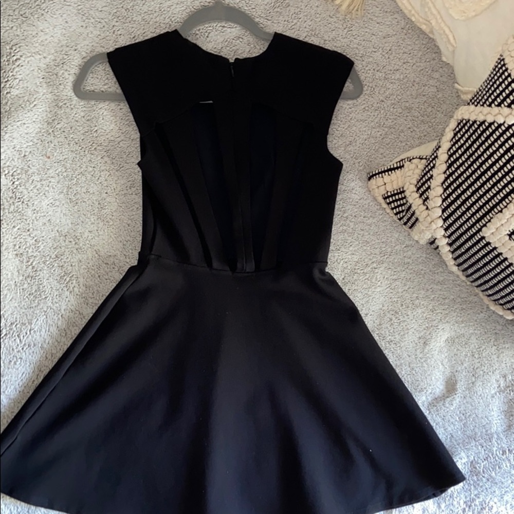 Cute little black dress with open back design
